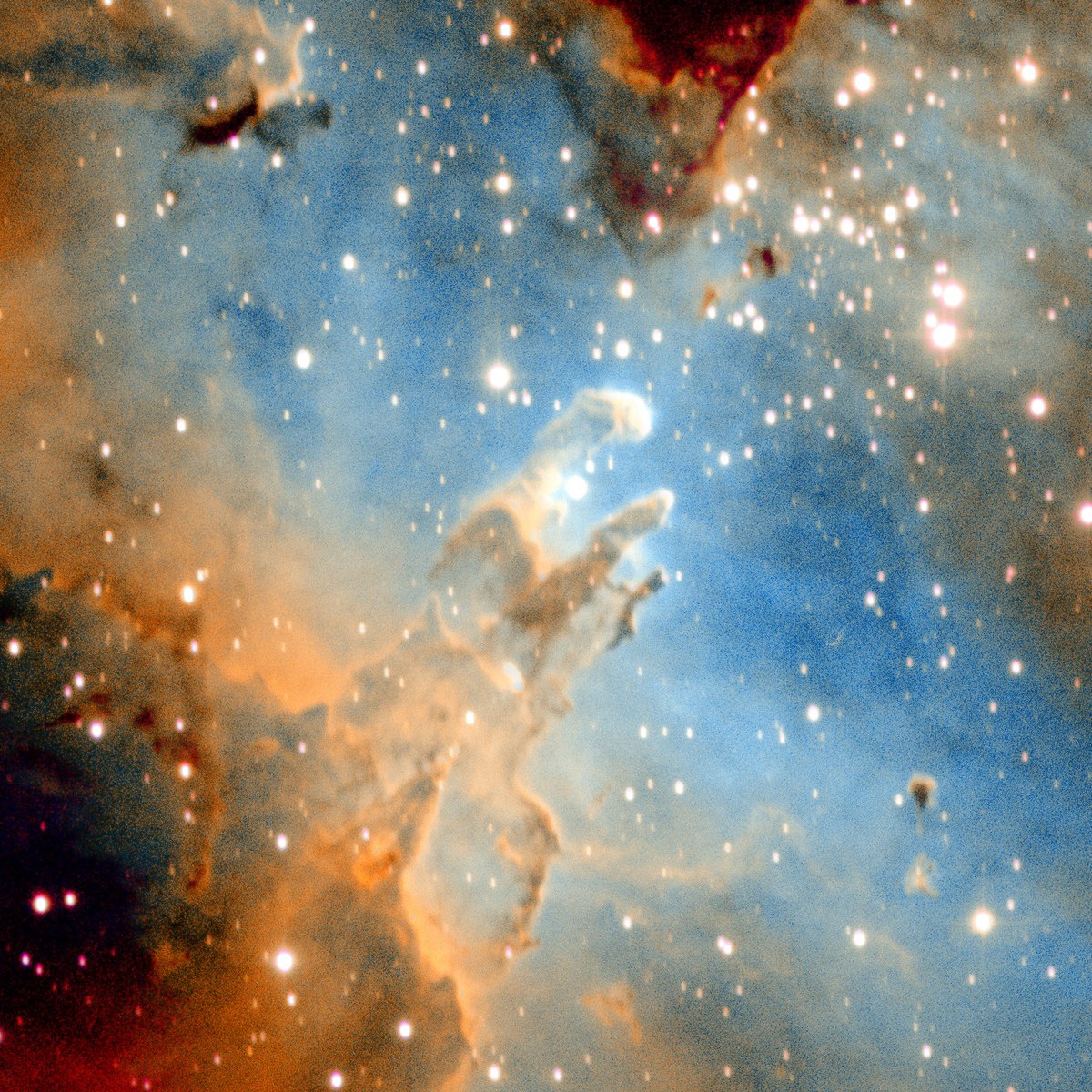 A close-up of three dark, finger-like columns of dust rising from lower left into a glowing blue hollow, their tips lit along the edges, with gold gas to the left and scattered stars.